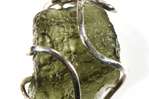 Moldavite pendant 1.01 grams in a silver cage (Ag 925), made in the Czech Republic, quality handmade, unisex pendant