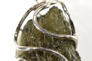 Moldavite pendant 1.28 grams in a silver cage (Ag 925), made in the Czech Republic, quality handmade, unisex pendant