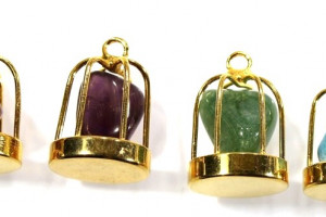 Pendant made of precious stone, stone in a gilded cage - turquoise (howlite)