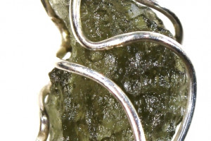 Moldavite pendant 1.23 grams in a silver cage (Ag 925), made in the Czech Republic, quality handmade, unisex pendant